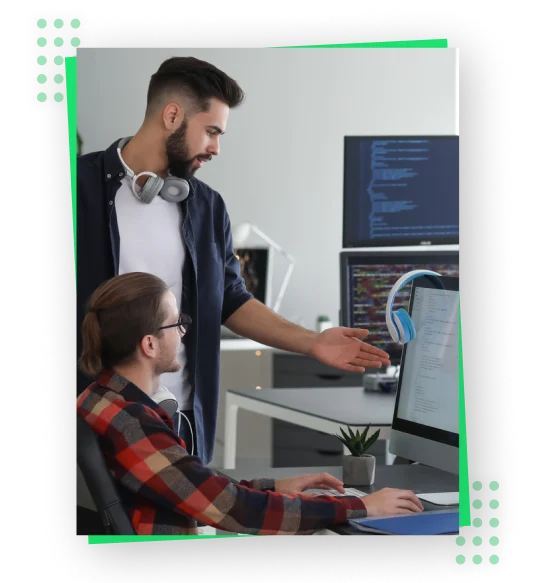 a man making another person understand by looking at a computer screen