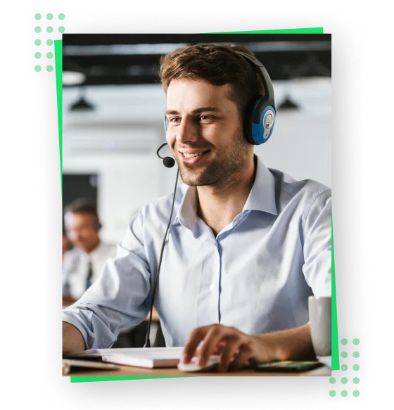 a man wearing headphones and smiling